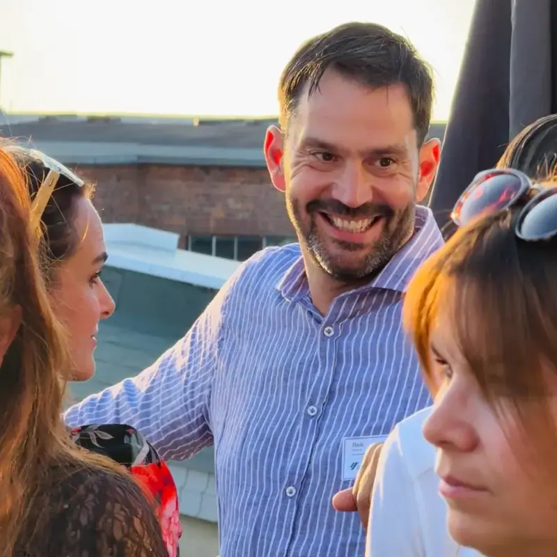 smiling-man-social-gathering